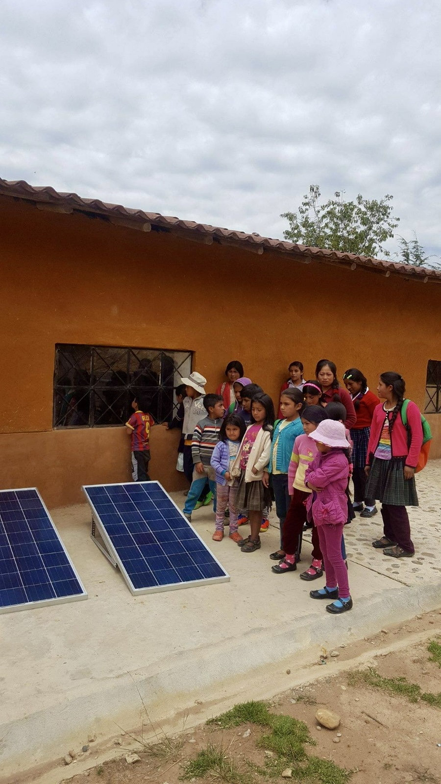 Children learning about solar energy in Peru